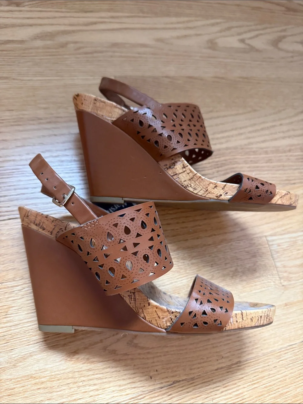BCBGeneration Brown Laser-Cut Cork Wedge Sandals